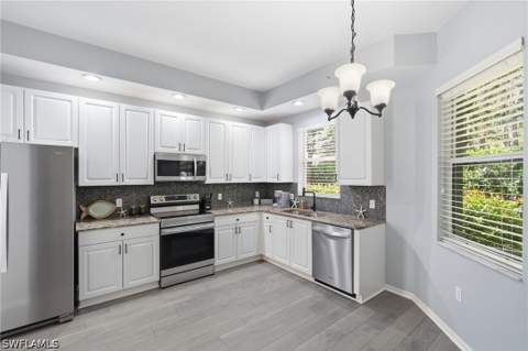 1425 Mariposa Cir 101, Naples FL - photo 16 of 50