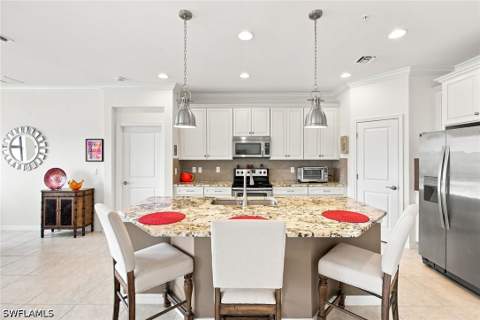 15157 Palmer Lake Cir 202, Naples FL - photo 11 of 35