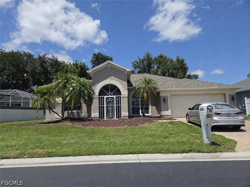 4 bedroom SingleFamilyResidence at 14820 Lake Olive Dr, The Grove, Fort Myers — photo 1