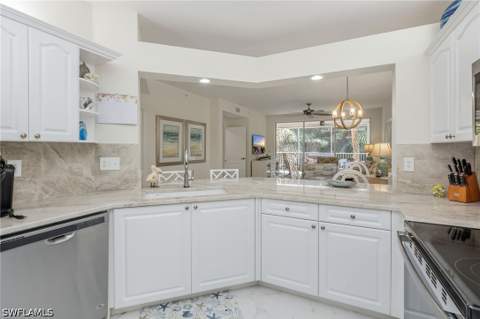 7693 Pebble Creek Cir 104, Naples FL - photo 10 of 36