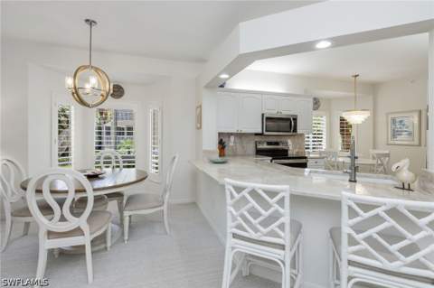 7693 Pebble Creek Cir 104, Naples FL - photo 8 of 36