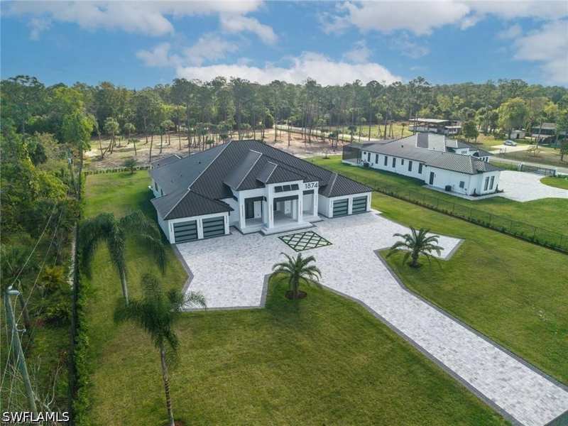 5 bedroom SingleFamilyResidence at 1874 39th St SW, Golden Gate Estates, Naples — photo 1