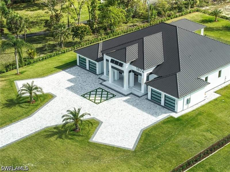 5 bedroom SingleFamilyResidence at 1874 39th St SW, Golden Gate Estates, Naples — photo 2