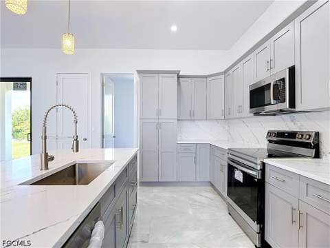 105 Ruby Ave N, Lehigh Acres FL - photo 8 of 42