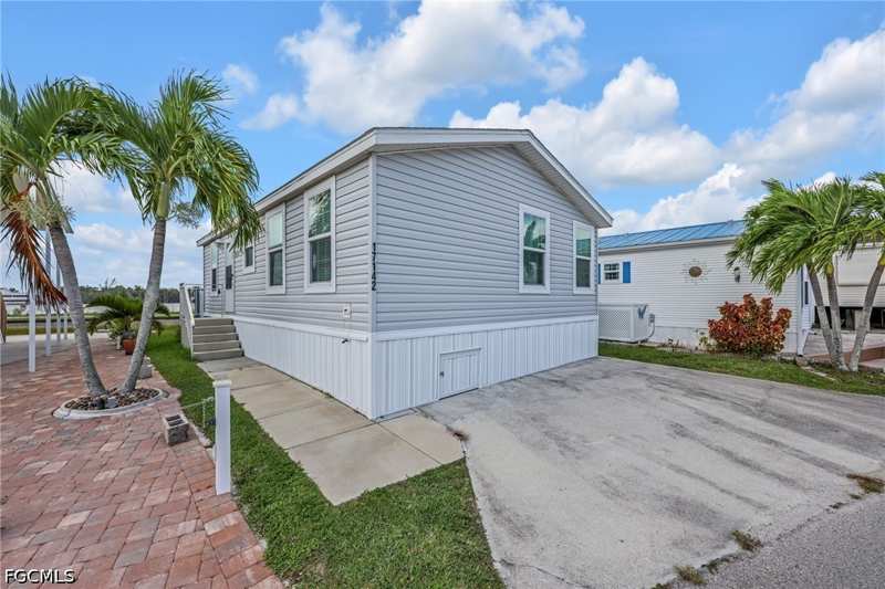 2 bedroom ManufacturedHome at 17142/17145 Casselberry Ln, Granada Lakes Adult Rv Resort, Fort Myers — photo 1