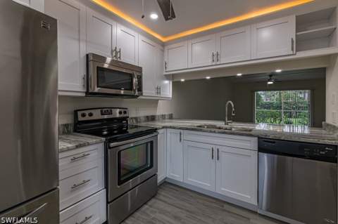 2562 Kings Lake Blvd 102, Naples FL - photo 10 of 22