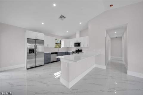 457 Woodman Dr, Lehigh Acres FL - photo 10 of 39