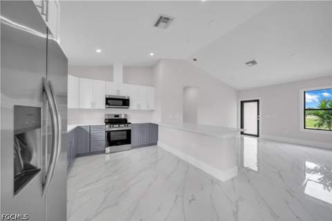 457 Woodman Dr, Lehigh Acres FL - photo 12 of 39