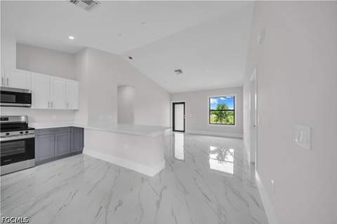 457 Woodman Dr, Lehigh Acres FL - photo 13 of 39