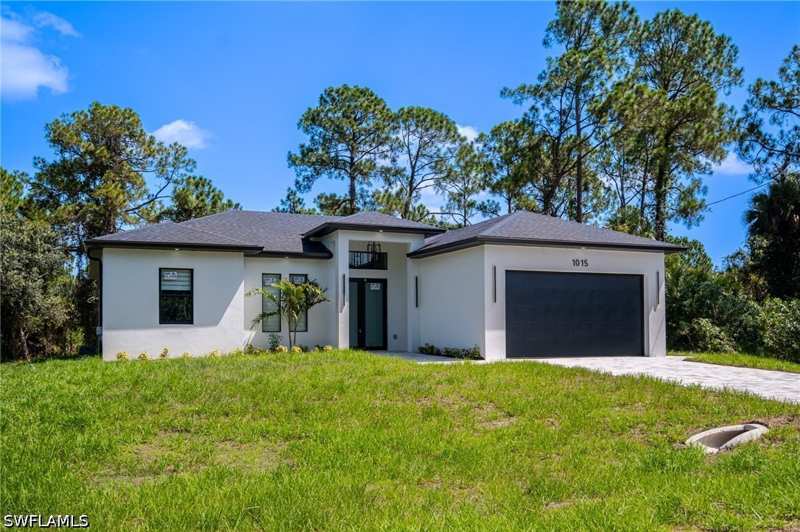 3 bedroom SingleFamilyResidence at 1015 Bagget St E, Lehigh Acres, Lehigh Acres — photo 1