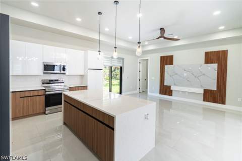 1015 Bagget St E, Lehigh Acres FL - photo 17 of 49