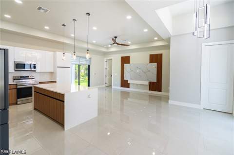 1015 Bagget St E, Lehigh Acres FL - photo 6 of 49