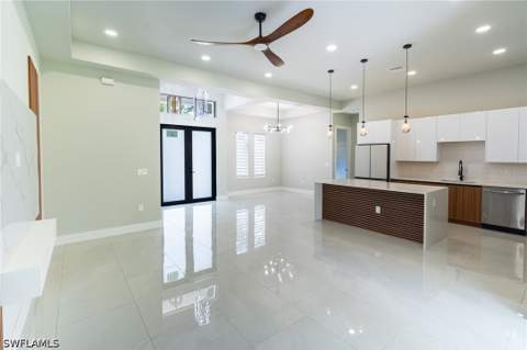 1015 Bagget St E, Lehigh Acres FL - photo 8 of 49