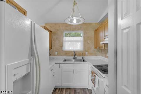 1210 NE 5th Pl, Cape Coral FL - photo 7 of 15