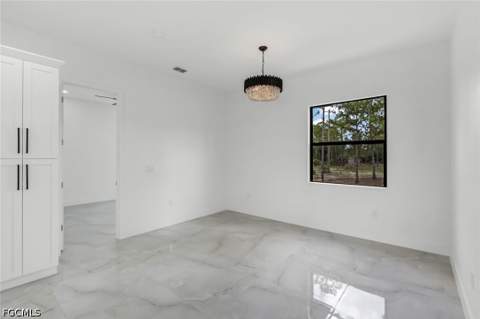 1315 Cortez Ave, Lehigh Acres FL - photo 11 of 23