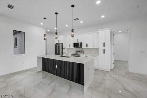 1315 Cortez Ave, Lehigh Acres FL - photo 6 of 23