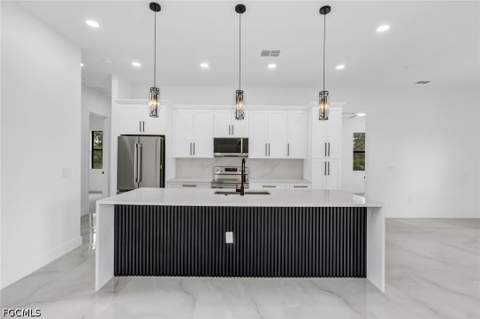 1315 Cortez Ave, Lehigh Acres FL - photo 9 of 23
