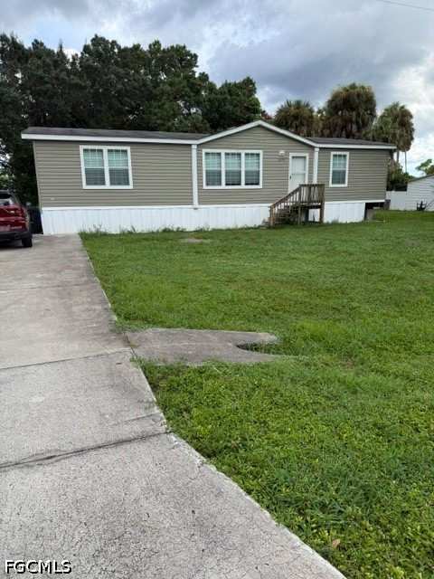3 bedroom ManufacturedHome at 2495 Zoysia Ln, Spring Woods M/H Subd, North Fort Myers — photo 1