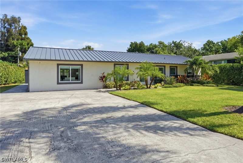 4 bedroom SingleFamilyResidence at 2965 Woodside Ave, Hallendale, Naples — photo 1