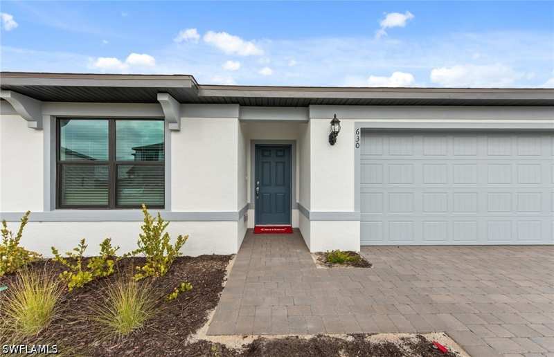 4 bedroom SingleFamilyResidence at 624 Oasis Lake Pl, Whispering Lakes, Lehigh Acres — photo 1