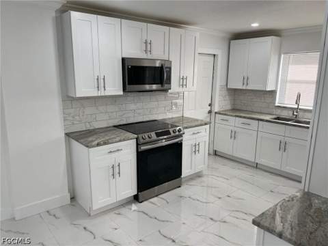 56 Cardinal Dr, North Fort Myers FL - photo 10 of 40
