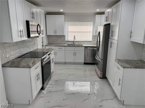56 Cardinal Dr, North Fort Myers FL - photo 9 of 40