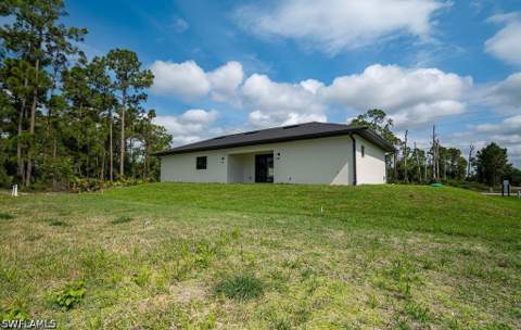 1160 Edelweiss St E, Lehigh Acres FL - photo 7 of 50
