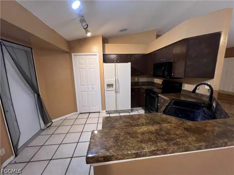 2411 Millie Ave S, Lehigh Acres FL - photo 6 of 11
