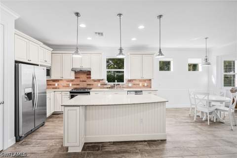 10647 Tiki Ct, Estero FL - photo 8 of 49