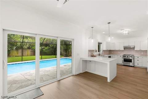 1128 Hilltop Dr, Naples FL - photo 10 of 34