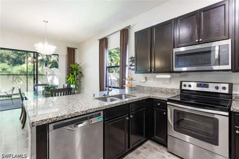 8785 Madrid Cir, Naples FL - photo 12 of 38