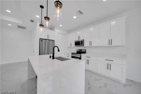 1003 Elgin St, Lehigh Acres FL - photo 11 of 42