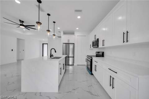 1003 Elgin St, Lehigh Acres FL - photo 12 of 42