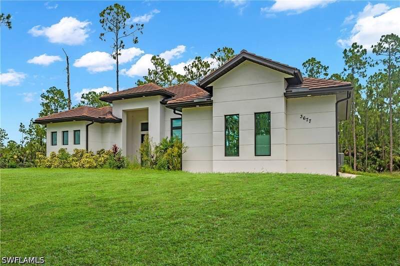 3 bedroom SingleFamilyResidence at 3677 8th Ave NE, Golden Gate Estates, Naples — photo 2