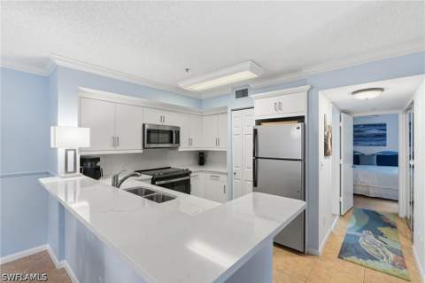1270 Wildwood Lakes Blvd 208, Naples FL - photo 6 of 37