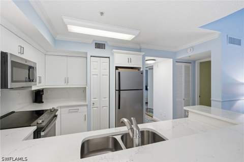 1270 Wildwood Lakes Blvd 208, Naples FL - photo 7 of 37