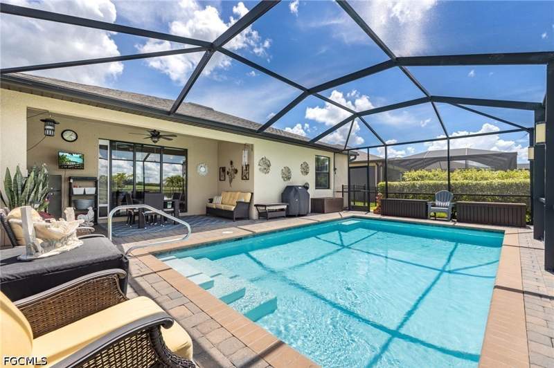 4 bedroom SingleFamilyResidence at 14517 Monrovia Ln, Portico, Fort Myers — photo 2