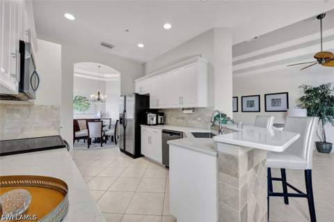 8723 Coastline Ct 202, Naples FL - photo 9 of 39