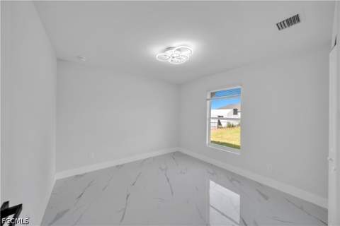 747 Fleming Ave S, Lehigh Acres FL - photo 13 of 28