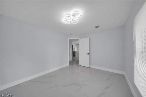 747 Fleming Ave S, Lehigh Acres FL - photo 8 of 28