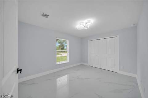 747 Fleming Ave S, Lehigh Acres FL - photo 9 of 28