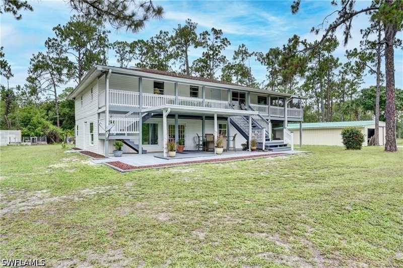 4 bedroom SingleFamilyResidence at 985 Honeybee Dr, Golden Gate Estates, Naples — photo 1