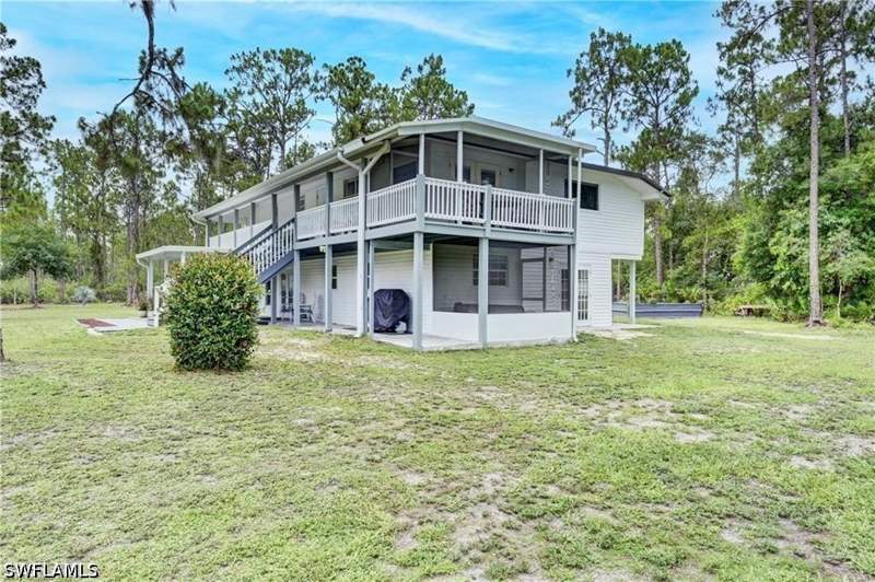 4 bedroom SingleFamilyResidence at 985 Honeybee Dr, Golden Gate Estates, Naples — photo 2