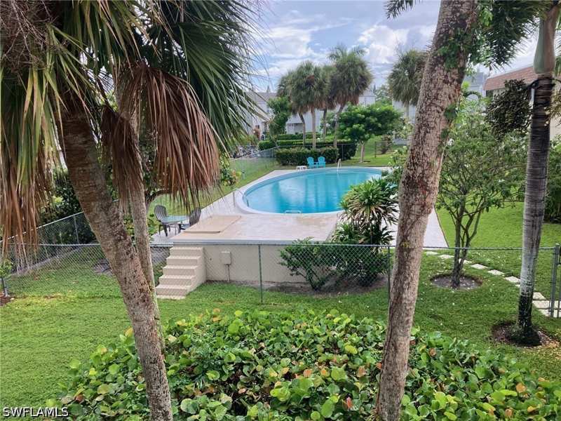 bedroom Condominium at 1062 Hartley Ave 208, Marco Manor Club, Marco Island — photo 1