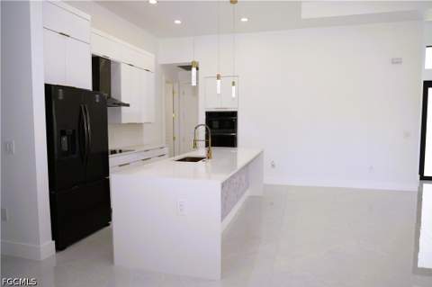 1214 Delores St E, Lehigh Acres FL - photo 9 of 23