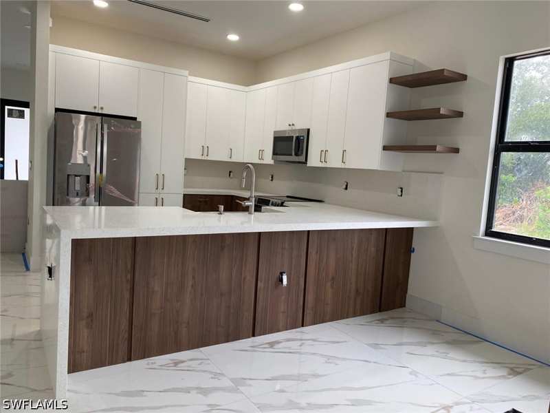 4 bedroom SingleFamilyResidence at 823 47th Ave NE, Golden Gate Estates, Naples — photo 1