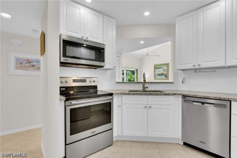 1542 Trafalgar Ln A, Naples FL - photo 7 of 28