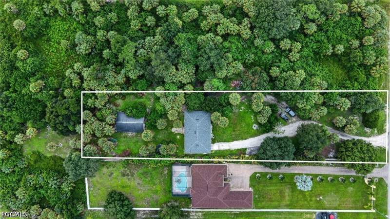3 bedroom SingleFamilyResidence at 940 17th St SW, Golden Gate Estates, Naples — photo 2