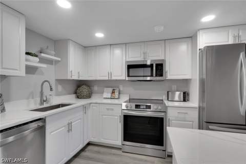 3 Bluebill Ave 107, Naples FL - photo 7 of 29