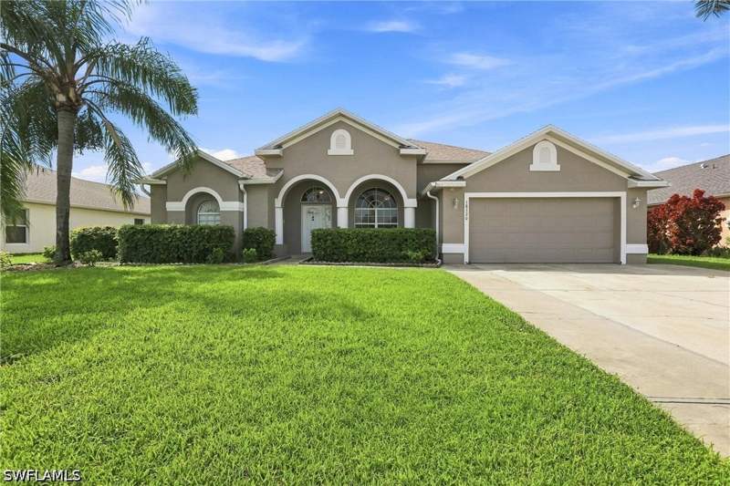 3 bedroom SingleFamilyResidence at 18320 Plumbago Ct, Town Lakes, Lehigh Acres — photo 2
